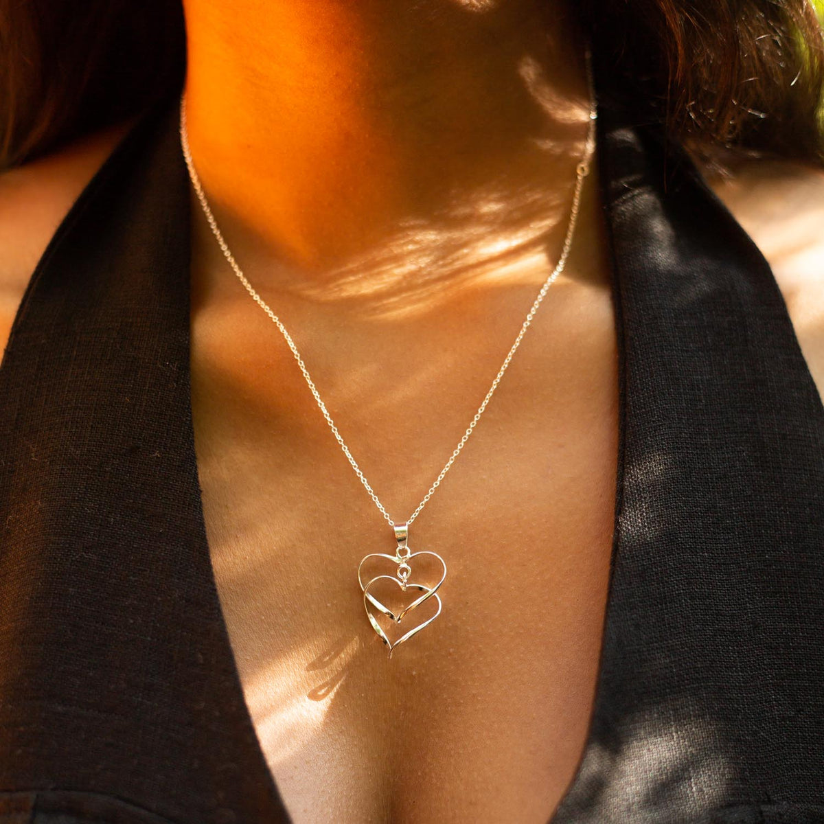 9 carat intertwined hearts necklace – Walter Bourke Jewellers